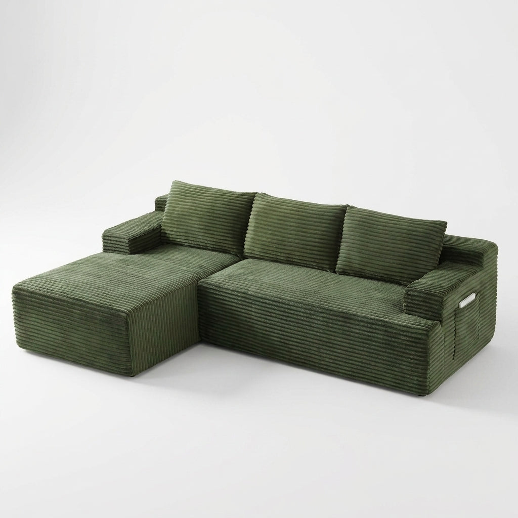 Green corduroy sectional sofa on a seamless studio background
