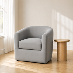 Angle | same living room, three-quarter view of the curved back and wood swivel base