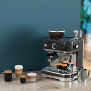 In use | Philips Barista Brew espresso machine on a kitchen counter with accessories, cup, and beans