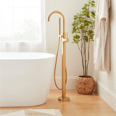 Lexia Floor Mounted Tub Filler Faucet with Hand Shower and Valve in Brushed Gold | product photo