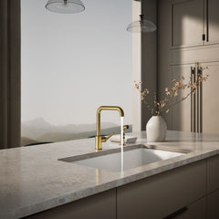 Kohler Purist Two-Hole Kitchen Sink Faucet with 8" Spout and Matching Finish Sidespray in Vibrant Brushed Moderne Brass | product photo