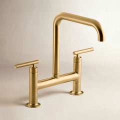 Kohler Purist Two-Hole Deck-Mount Bridge Kitchen Sink Faucet in Vibrant Brushed Moderne Brass | product photo