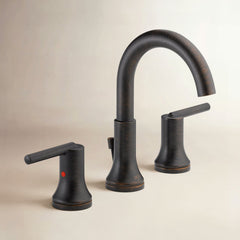 Trinsic Widespread Bathroom Faucet 3 Hole, 2-handle Bathroom Sink Faucet with Drain Assembly in Venetian Bronze | product photo