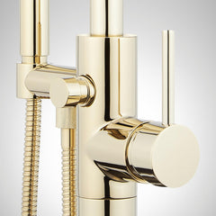 Lexia Floor Mounted Tub Filler Faucet and Valve with Stops in Polished Brass | detail photo
