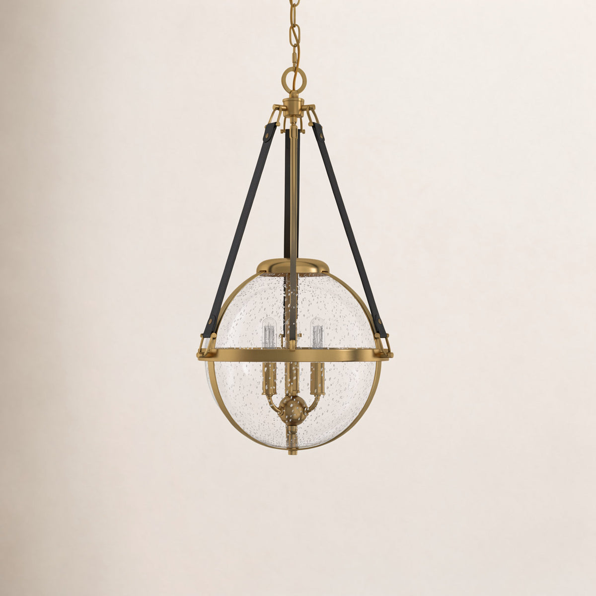 3-Light Pendant with Seeded Glass Globe Shade in Brass