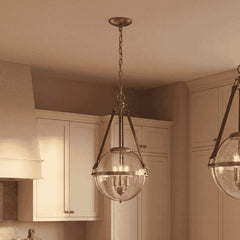 3-Light Pendant with Seeded Glass Globe Shade in Brass