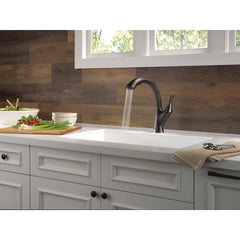Linden Pull Out Single Handle Kitchen Faucet with Accessories in Venetian Bronze | product photo