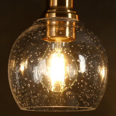 5-Light Linear Pendant Light with Seeded Glass Shades in Matte Black and Brass