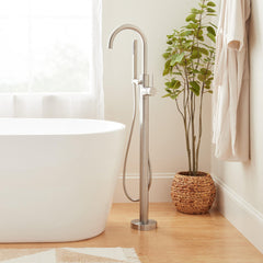Lexia Floor Mounted Tub Filler Faucet and Valve in Brushed Nickel | product photo