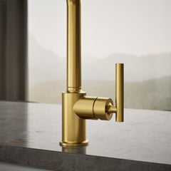 Kohler Purist Two-Hole Kitchen Sink Faucet with 8" Spout and Matching Finish Sidespray in Vibrant Brushed Moderne Brass | detail photo