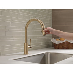 Trinsic Gold Kitchen Faucet with Swivel Pull Down Sprayer, Magnetic Docking, Champagne Bronze | product photo