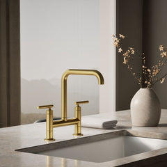 Kohler Purist Two-Hole Deck-Mount Bridge Kitchen Sink Faucet in Vibrant Brushed Moderne Brass | product photo