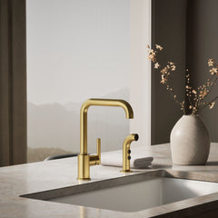 Kohler Purist Two-Hole Kitchen Sink Faucet with 8" Spout and Matching Finish Sidespray in Vibrant Brushed Moderne Brass | product photo