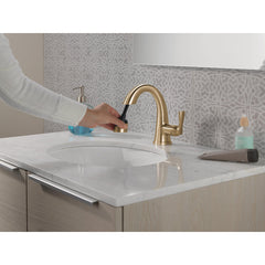Stryke Single Hole Pull Out Sprayer Bathroom Faucet, Single Handle Bathroom Sink Faucet in Lumicoat Champagne Bronze | product photo