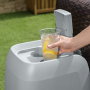 Cup holder | Glass of iced lemon water resting in the pump's built-in drink holder
