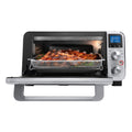 Roasting | Door open with ribs roasting in the basket under the top element