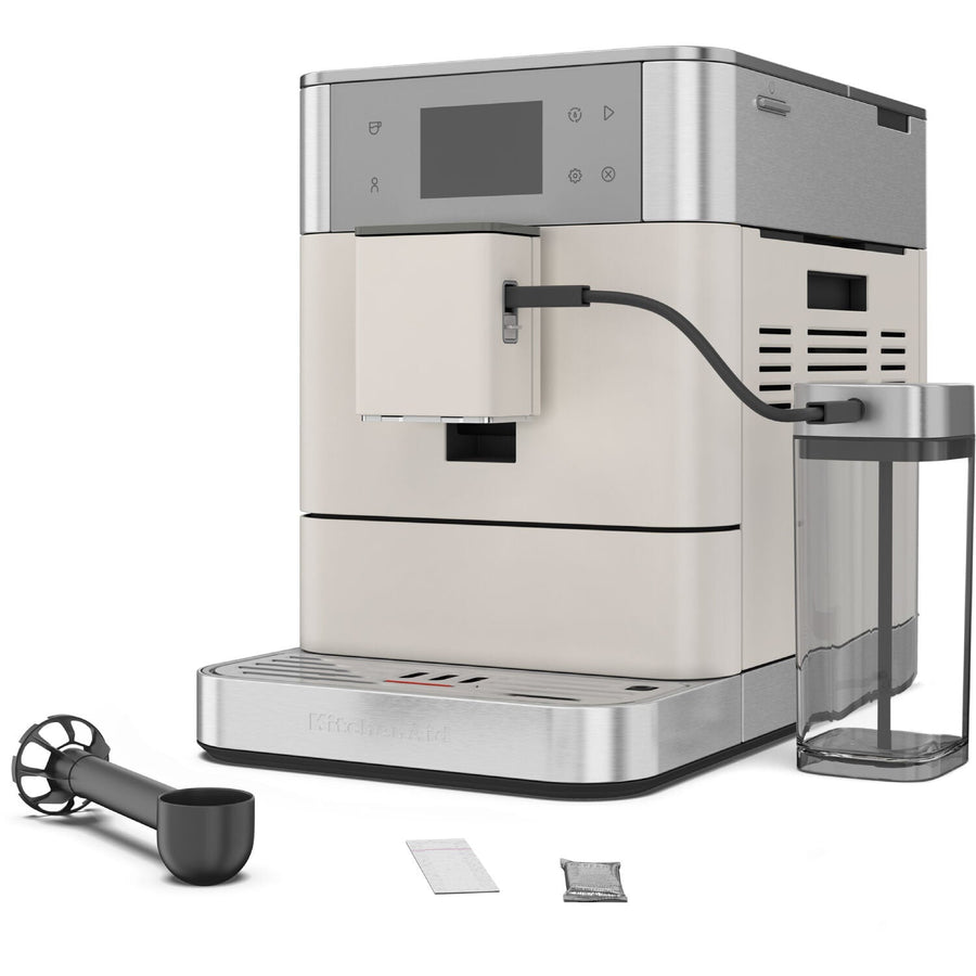 Angle | KitchenAid KF7 fully automatic espresso machine three-quarter view showing control panel and milk carafe