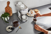 Lifestyle | KitchenAid KES6503 espresso machine on countertop with cups and accessories