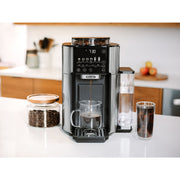 In use | De'Longhi TrueBrew coffee maker pouring coffee into a cup on countertop