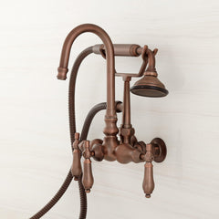 Pasaia Wall Mounted Tub Faucet with Hand Shower in Oil Rubbed Bronze | product photo