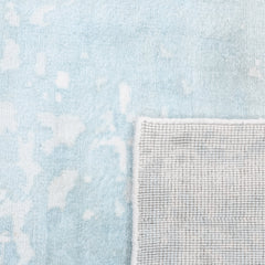 Abstract Area Rug, 5 ft x 8 ft in Cream Cotton Blend