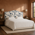 Clay corner | Corner view showing the headboard, bedding, nightstands, and surrounding room