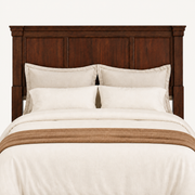 Detail | Close view of the three wood panels, crown molding, posts and natural grain variation