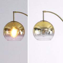 Arched Floor Lamp with Brushed Brass Base and Gold Glass Shade