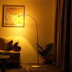 Arched Floor Lamp with Orange Shade and White Base