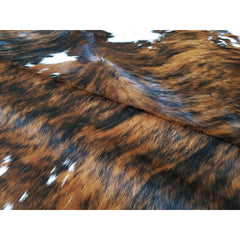 Area Rug with Cowhide Construction in Black, White, and Brown