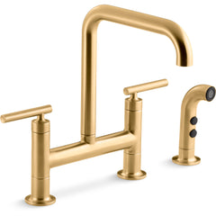 Kohler Purist Two Handle Deck-Mounted Bridge Kitchen Sink Faucet with Side Spray in Vibrant Brushed Moderne Brass | product photo