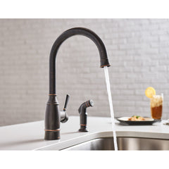 Noell Single-Handle Standard Kitchen Faucet with Side Sprayer in Mediterranean Bronze | product photo