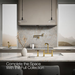 Kohler Purist Two Handle Deck-Mounted Bridge Kitchen Sink Faucet with Side Spray in Vibrant Brushed Moderne Brass | product photo