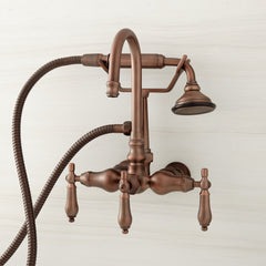 Pasaia Wall Mounted Tub Faucet with Hand Shower in Oil Rubbed Bronze | product photo