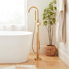 Lexia Floor Mounted Tub Filler Faucet and Valve in Brushed Gold | product photo