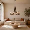 Living room | the wagon-wheel chandelier over a coffee table