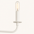 Hardware | close view of a candle socket, bobeche, and bulb