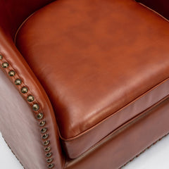 Barrel Chair with Swivel Base, Faux Leather Upholstery and Black Legs