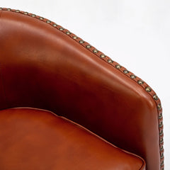 Barrel Chair with Swivel Base, Faux Leather Upholstery and Black Legs