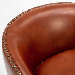 Barrel Chair with Swivel Base, Faux Leather Upholstery and Black Legs