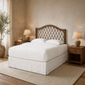 Angle | Three-quarter view of the brown rattan headboard with an arched top and open diamond pattern