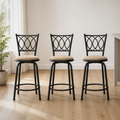 In a room | all three matching stools at a warm oak dining room's island edge, soft morning sidelight from the left