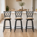 In a room | all three matching stools at a bright flax dining room's island edge, soft midday light from the left
