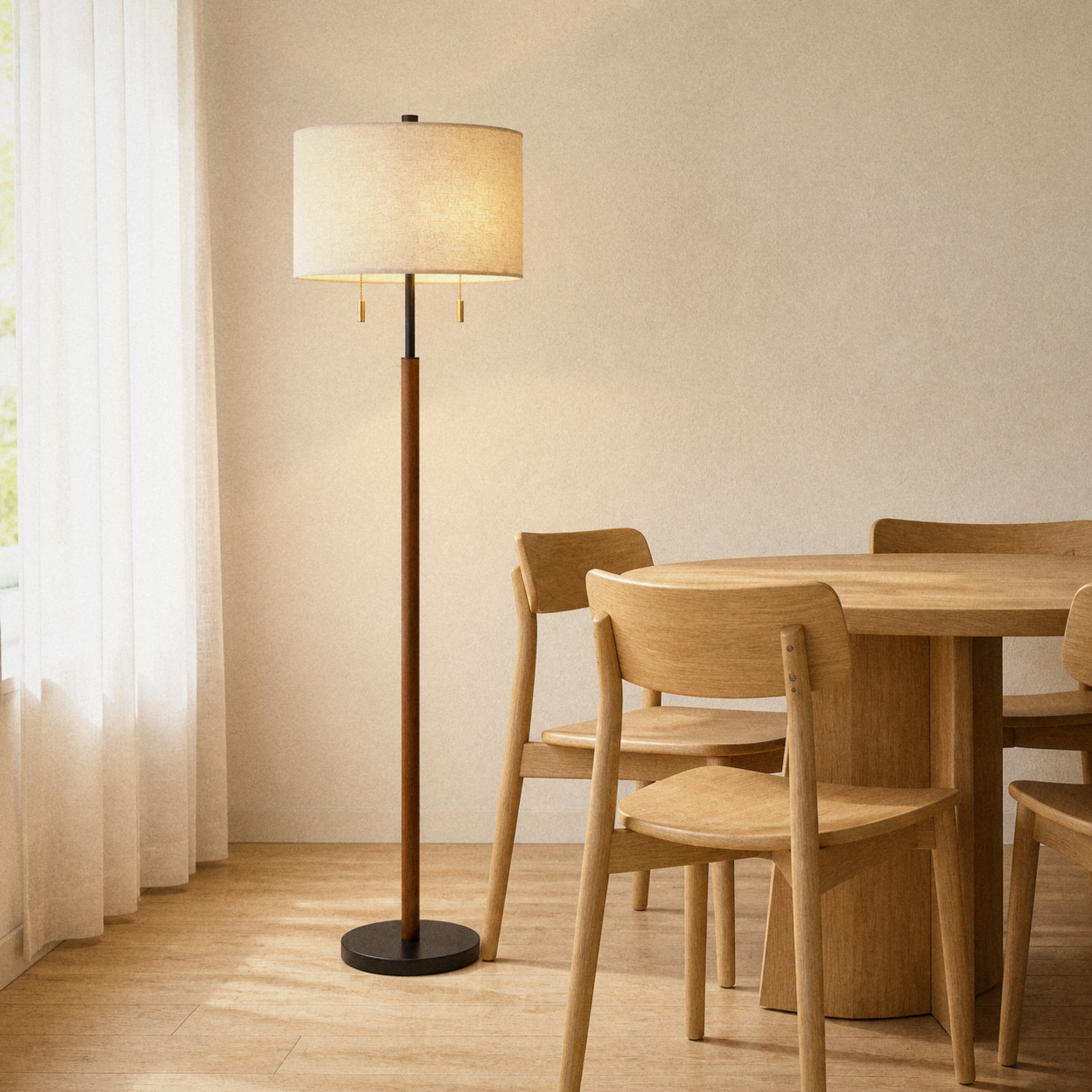 In a room | the black-and-wood floor lamp beside a round oak dining table, soft morning light from the left