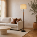 In a room | the floor lamp beside a sofa in a warm living room, soft afternoon light