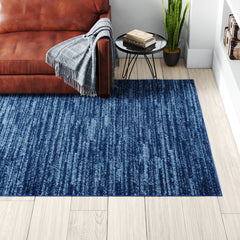 Room | The Bremhaus Ecclesbourne Solid Area Rug in a styled room