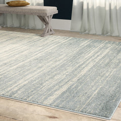 Room | The Bremhaus Fairbrook Blue Cream Area Rug in a styled room