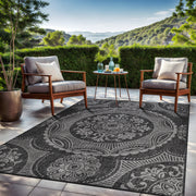 Outdoor patio | the rug shown on a stone patio with outdoor seating