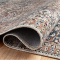 Rolled corner | the backing and edge binding shown rolled back