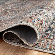 Rolled corner | the backing and edge binding shown rolled back